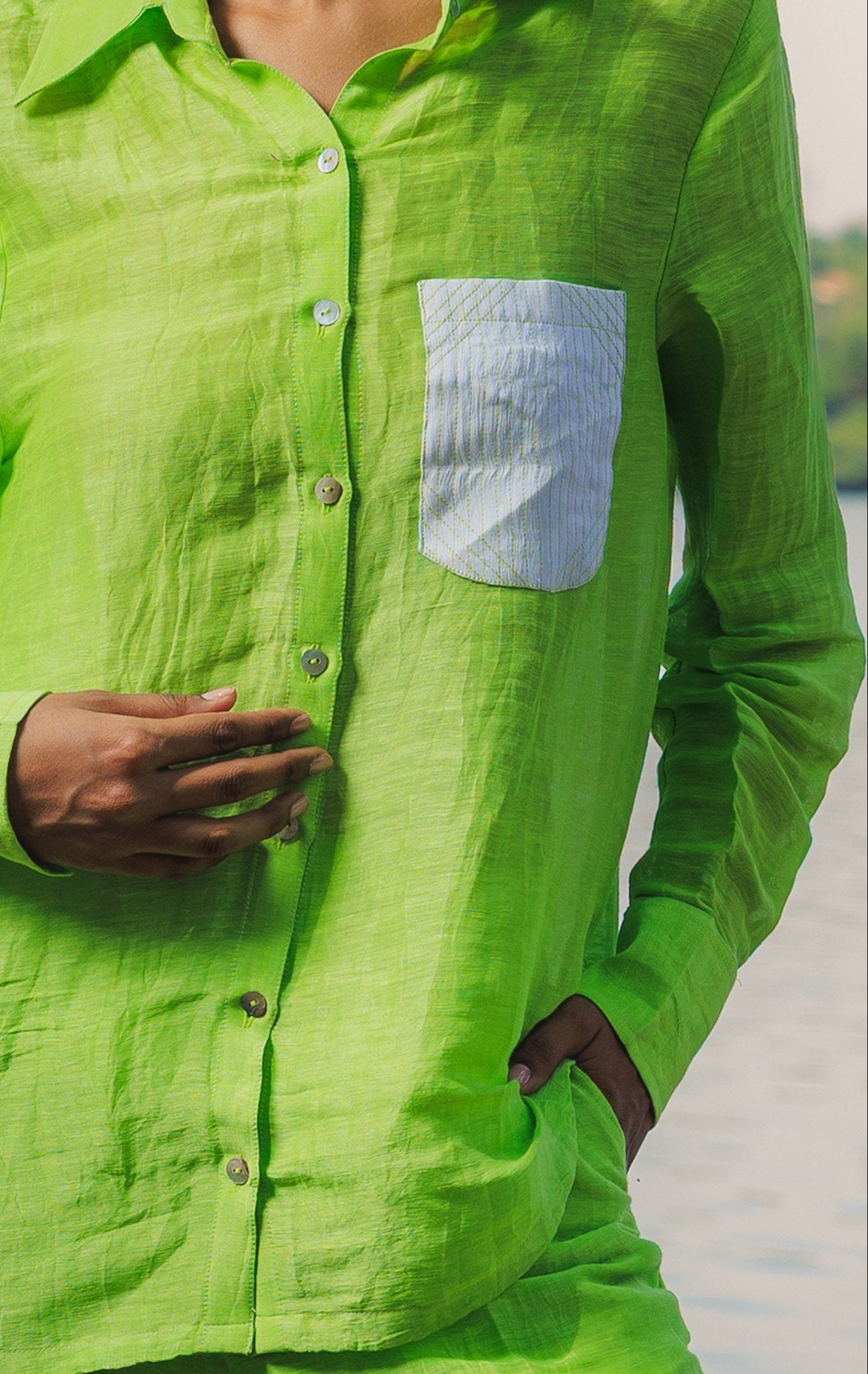 Lime Shirt button and pocket detail on model