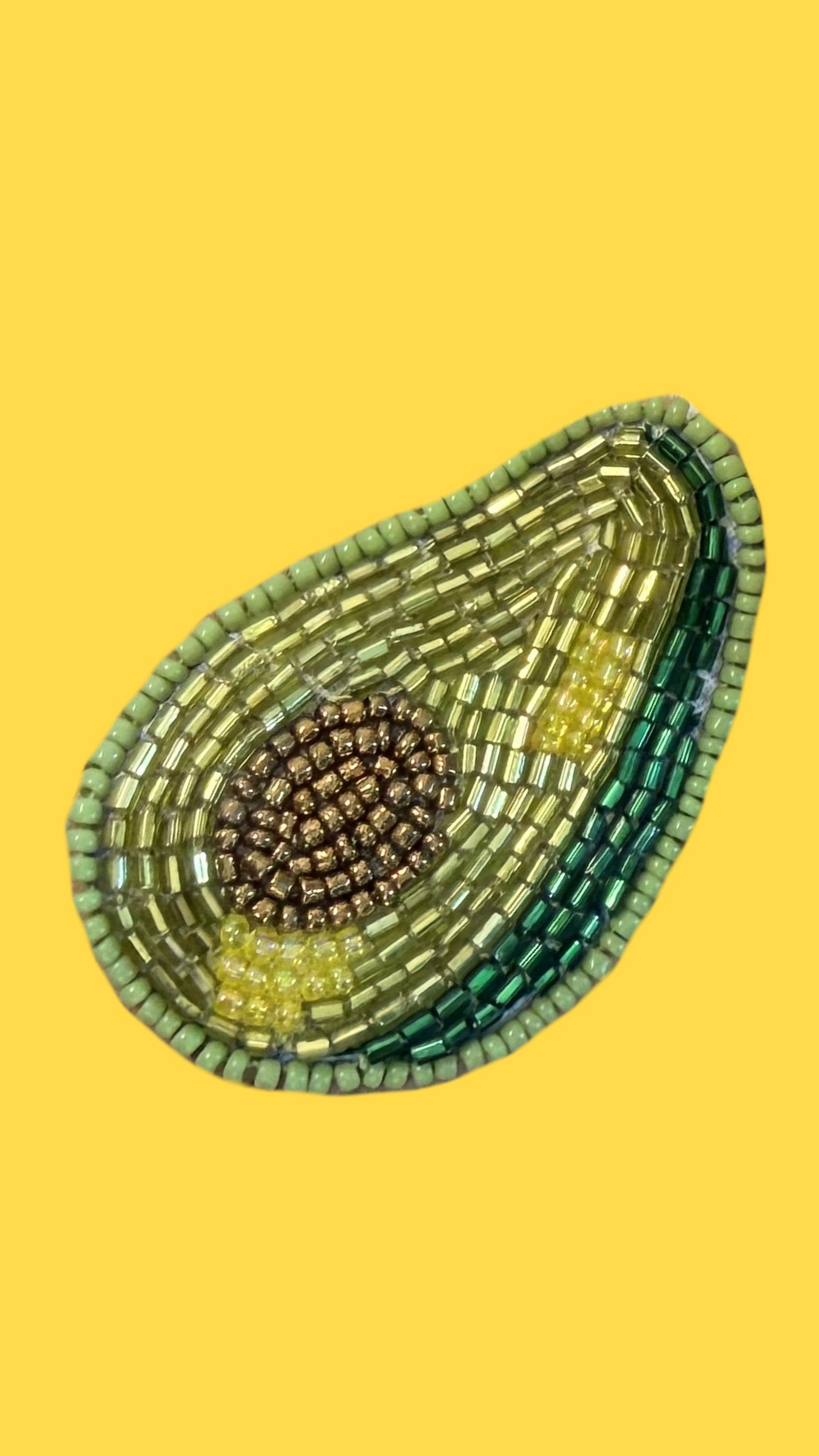Hand-embroidered brooch detail on an Aishita Johri top