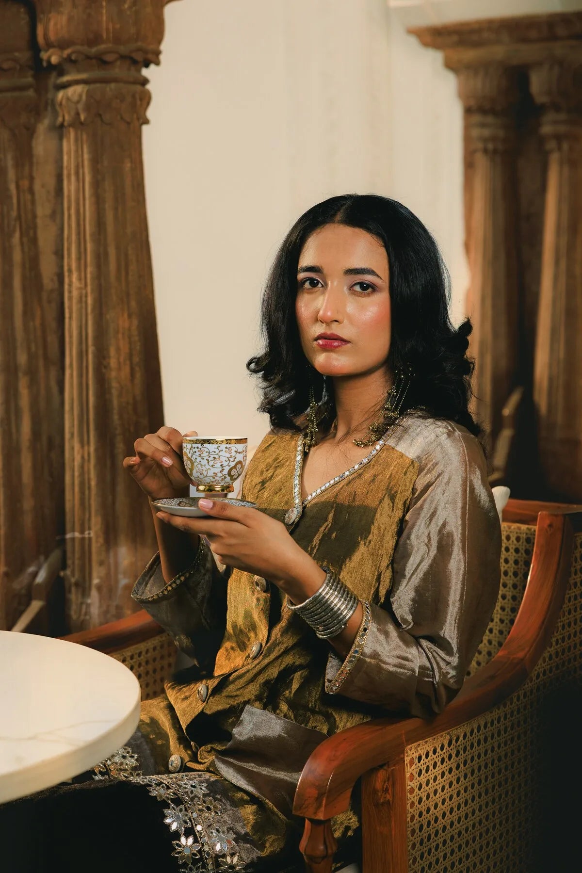Zari Zuri gold interior portrait